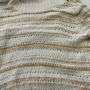 a white gold sweater (knitted)